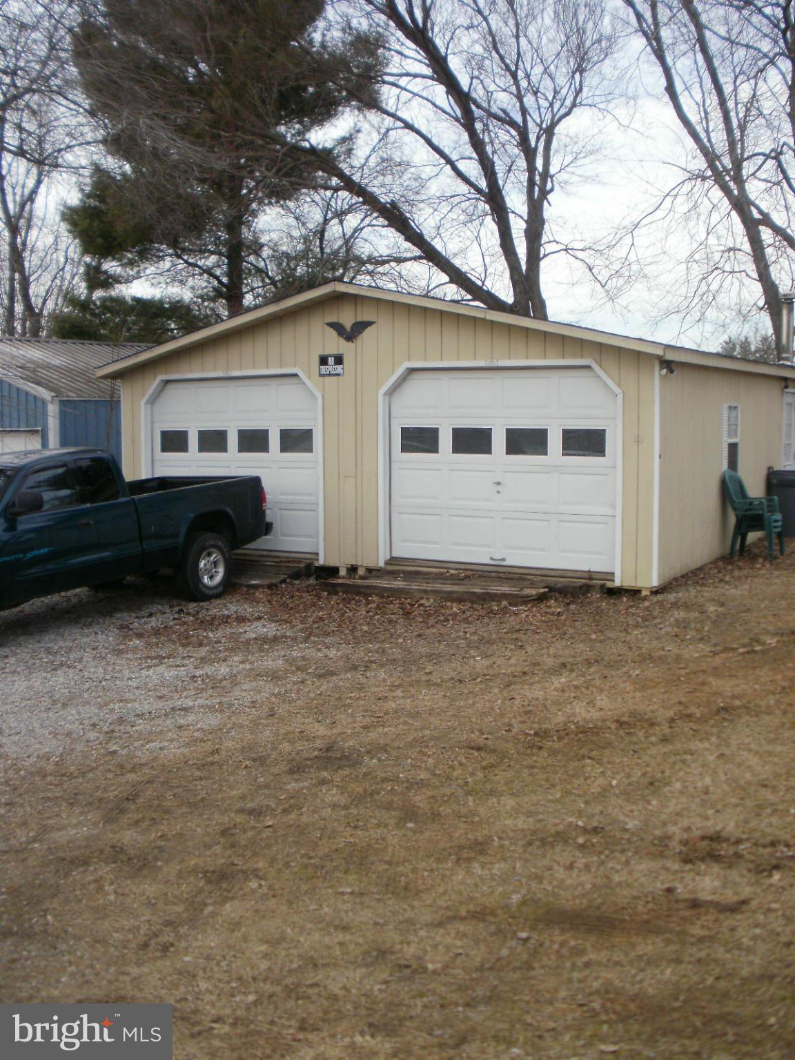 23 Elk Mills Road Elkton, MD 21921 - Photo 3 of 6 DETACHED GARAGE WITH WOOD STOVE