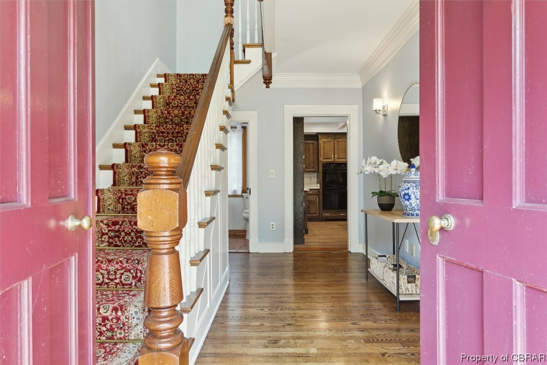 7175 Ware House Road Gloucester, VA 23061 - Photo 5 of 39 Hardwood floored foyer entrance with crown molding