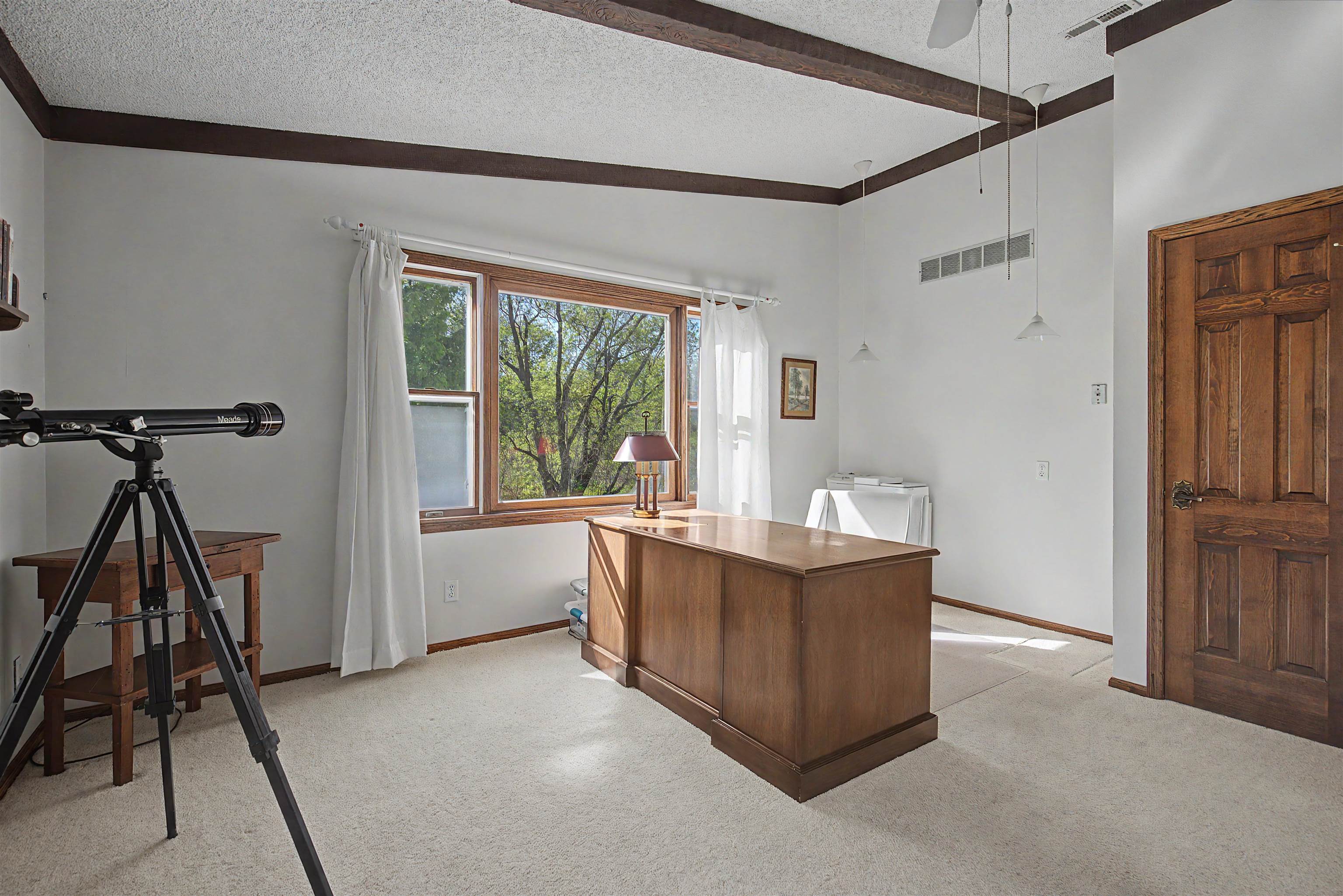 17380 Corbett Road Mount Carroll, IL 61053 - Photo 14 of 65 a living room with furniture and a window