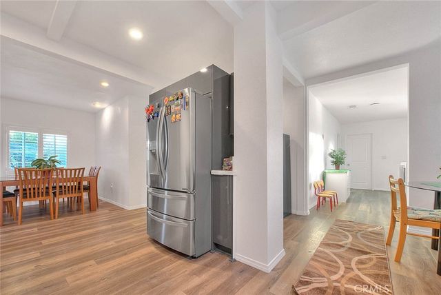 a view of a living room and a dining room