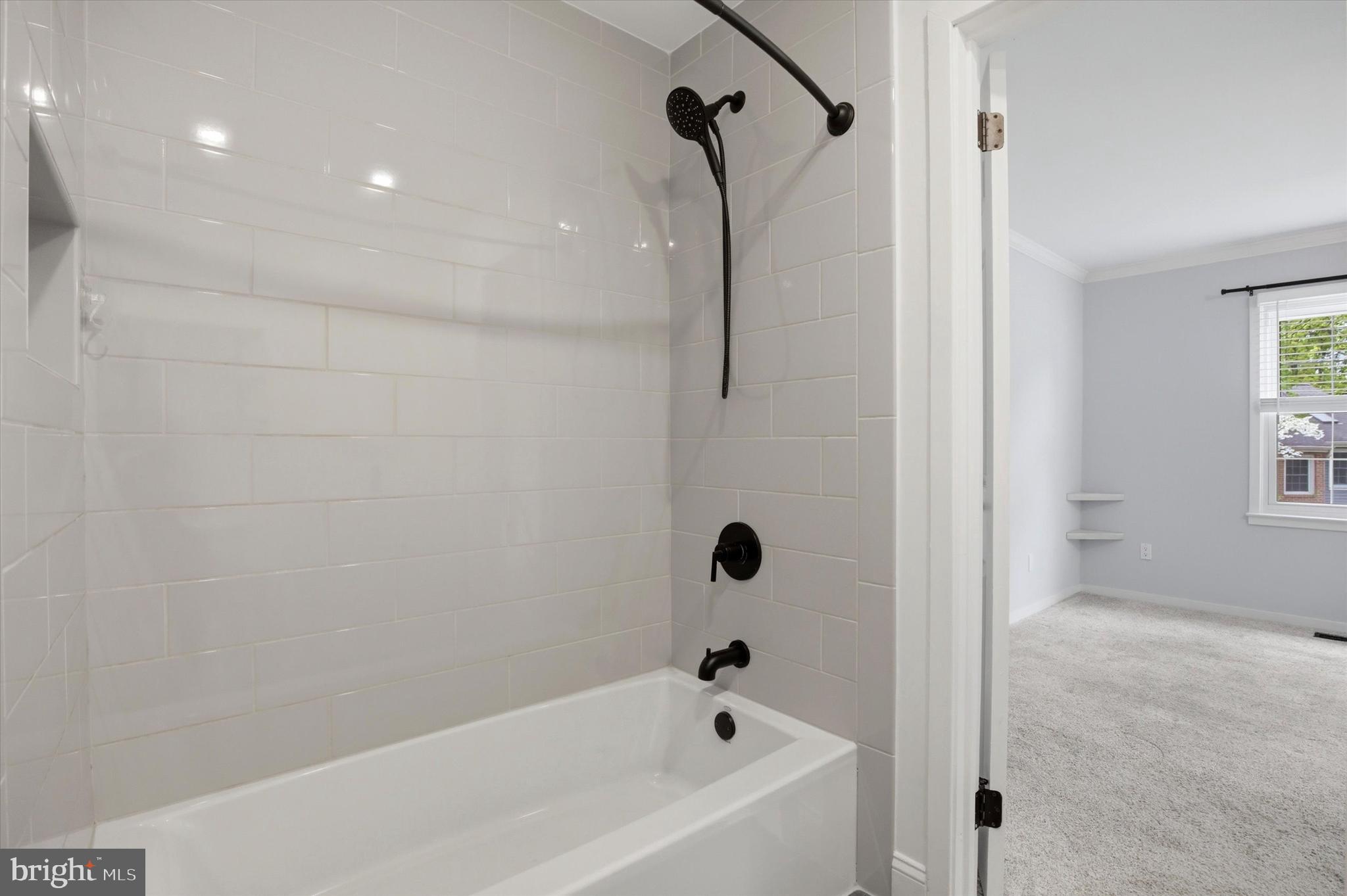 3 Windsor Circle Chesterbrook, PA 19087 - Photo 16 of 29 a bathroom with a bathtub and shower