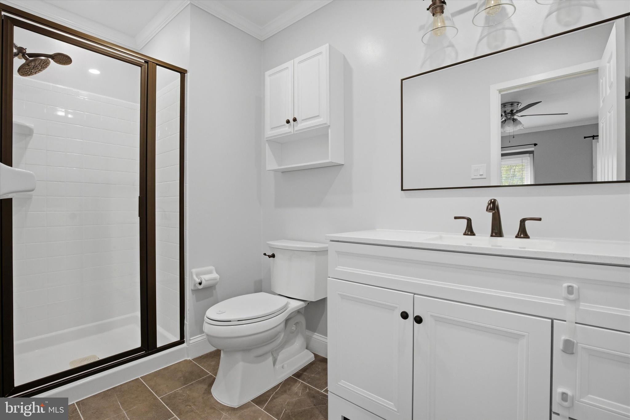 3 Windsor Circle Chesterbrook, PA 19087 - Photo 20 of 29 a bathroom with a sink a toilet and shower