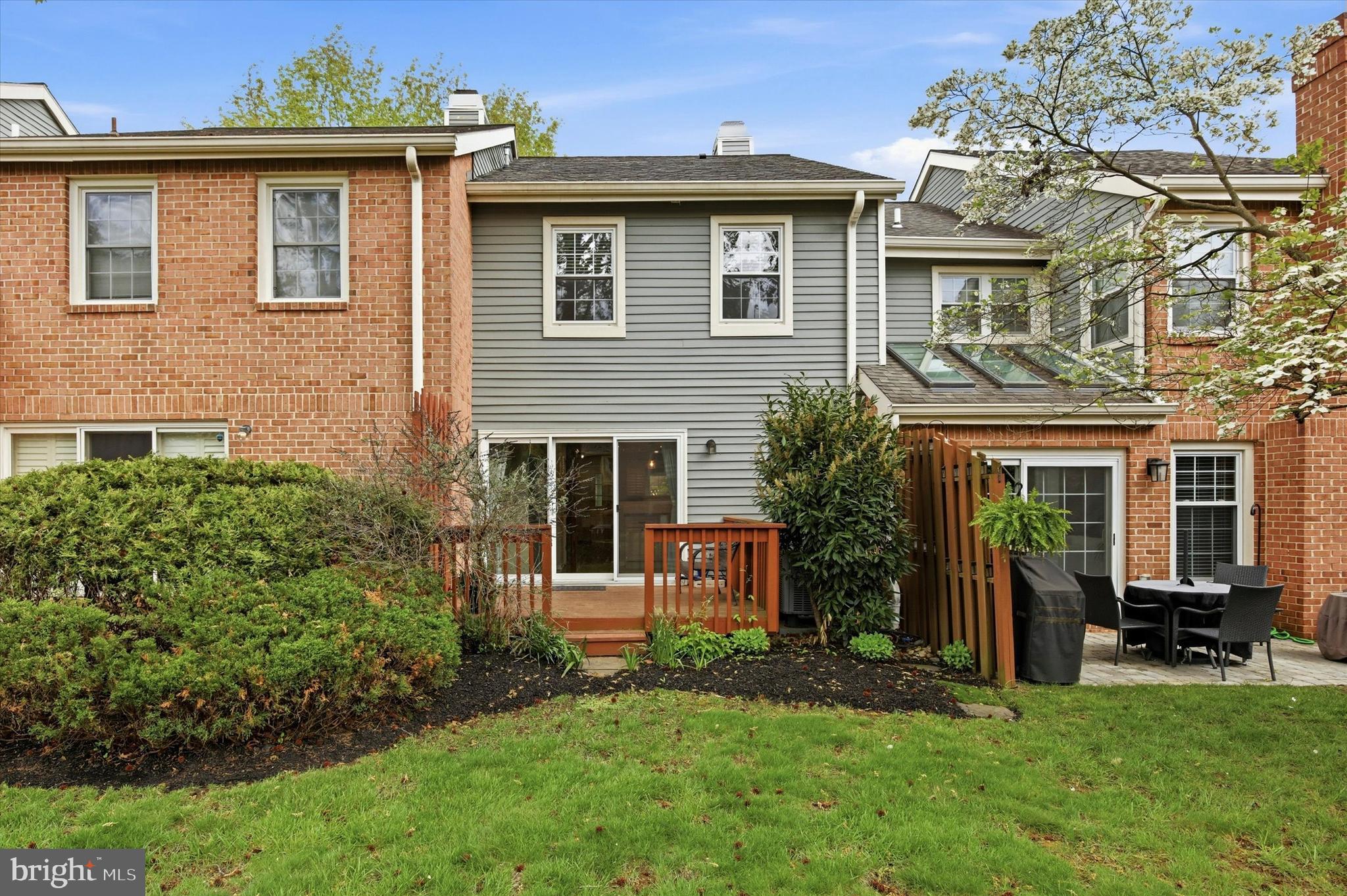 3 Windsor Circle Chesterbrook, PA 19087 - Photo 27 of 29 a front view of a house with a yard and potted plants