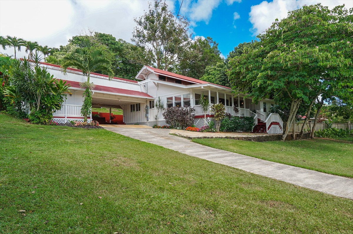 6410 Puupilo Road, Unit A1 Kapaa, HI 96746 - Photo 1 of 19 a view of a house with a yard porch and sitting area