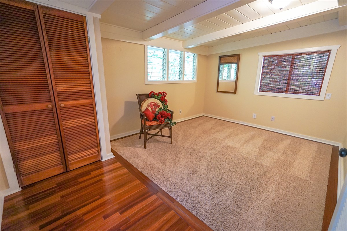 6410 Puupilo Road, Unit A1 Kapaa, HI 96746 - Photo 14 of 19 a view of an entryway with wooden floor