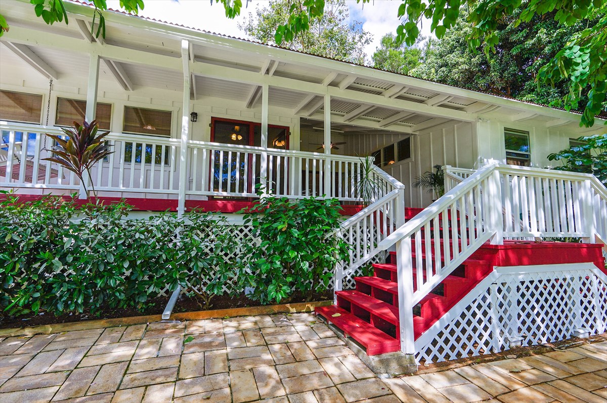 6410 Puupilo Road, Unit A1 Kapaa, HI 96746 - Photo 2 of 19 a view of a house with wooden deck