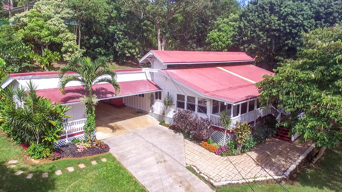 6410 Puupilo Road, Unit A1 Kapaa, HI 96746 - Photo 3 of 19 aerial view of a house with a yard