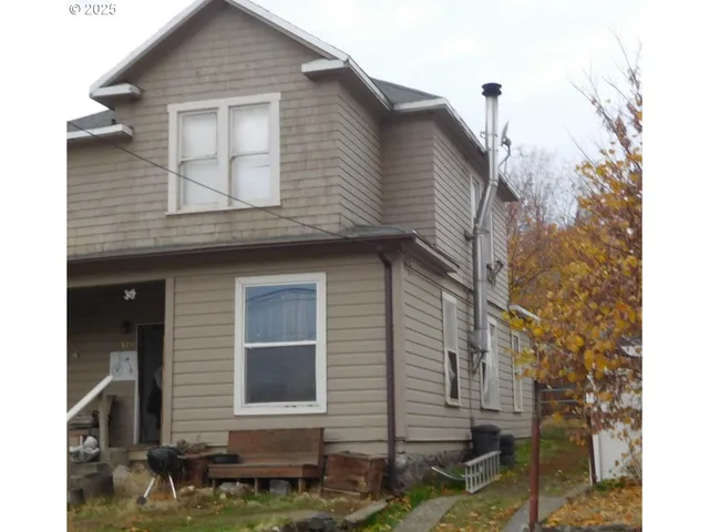 a front view of a house with a balcony