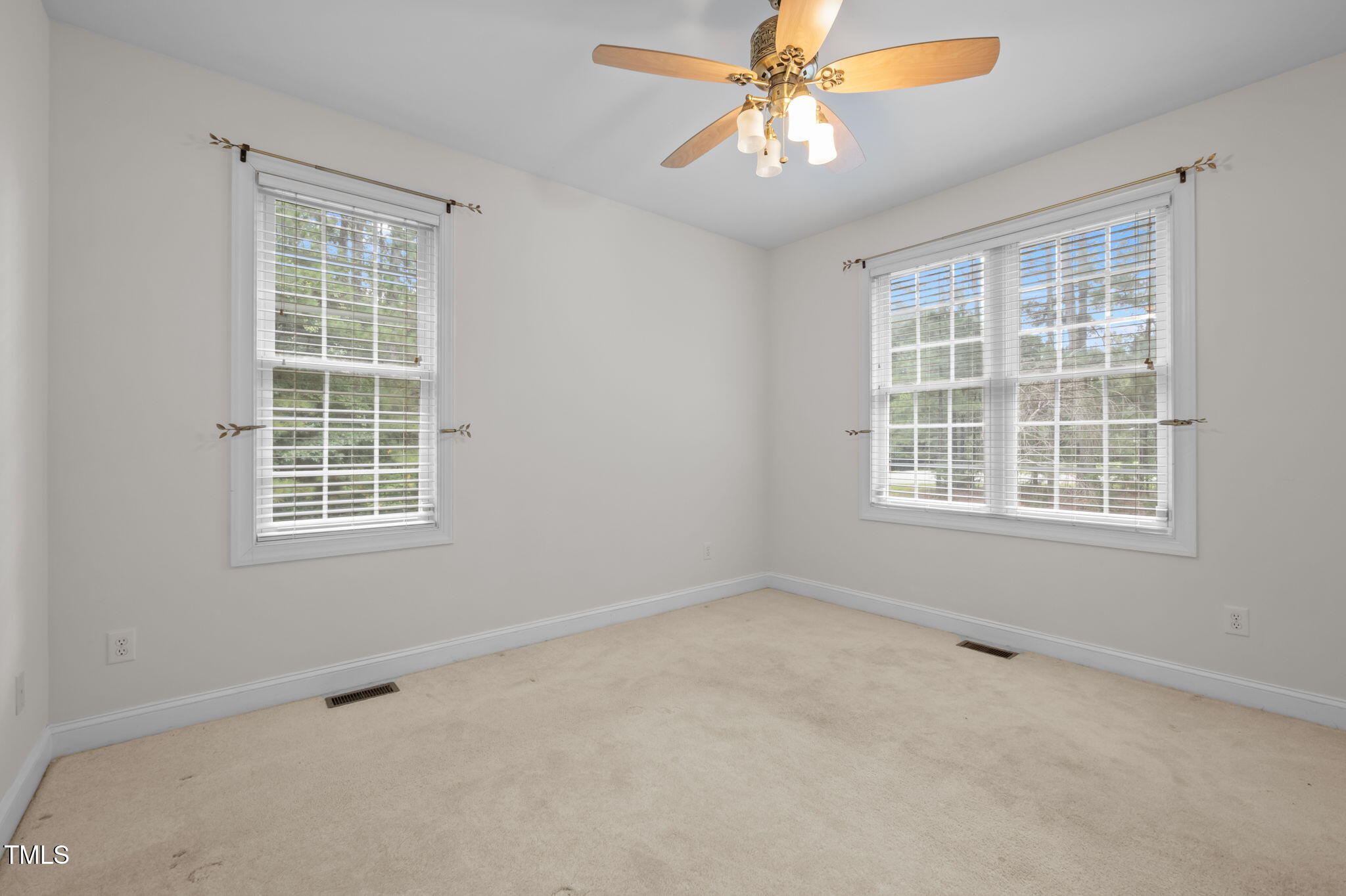9 Piney Grove Road Bahama, NC 27503 - Photo 17 of 33 an empty room with a window