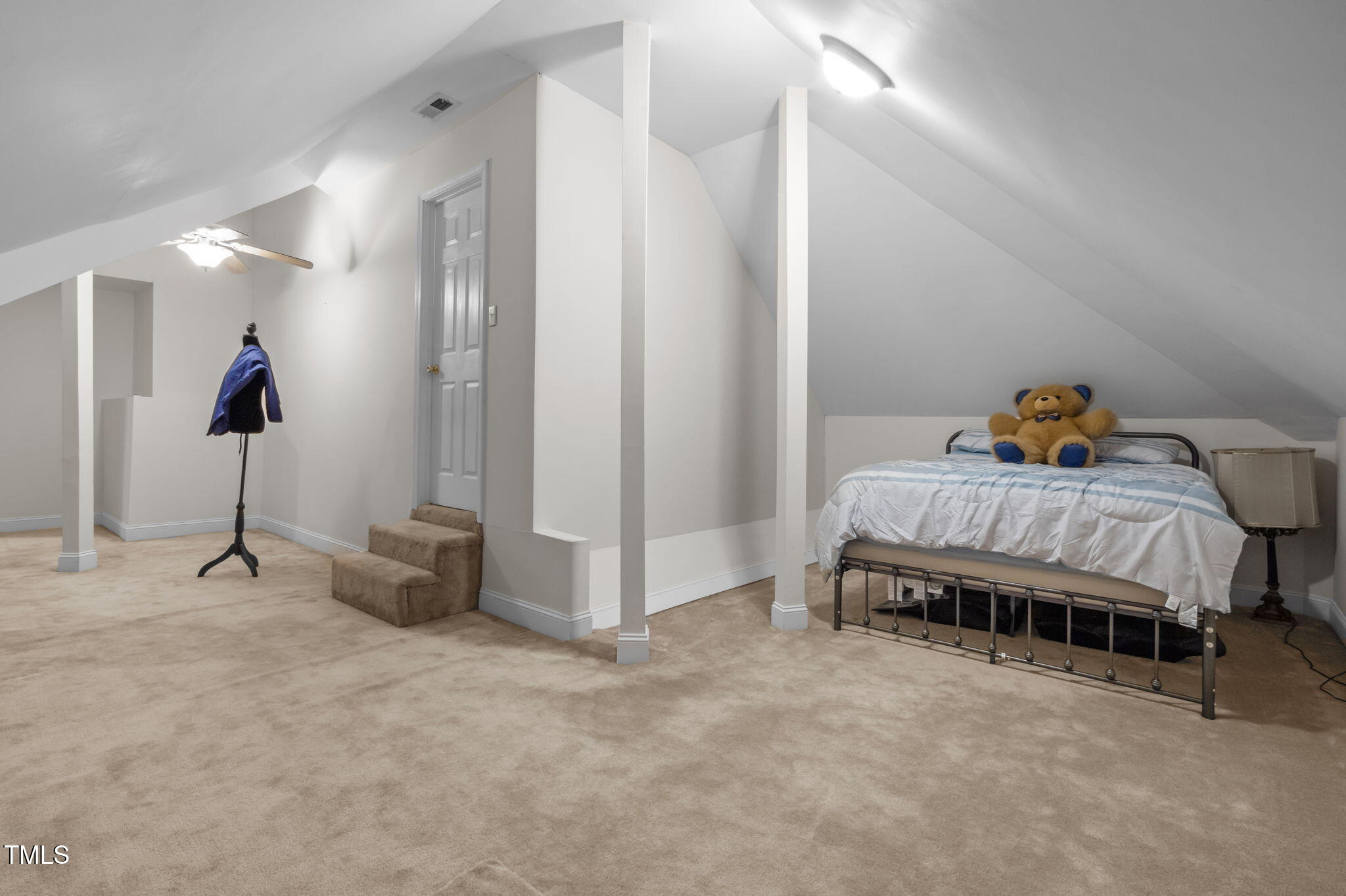 9 Piney Grove Road Bahama, NC 27503 - Photo 25 of 33 a bedroom with a bed and a view of bathroom