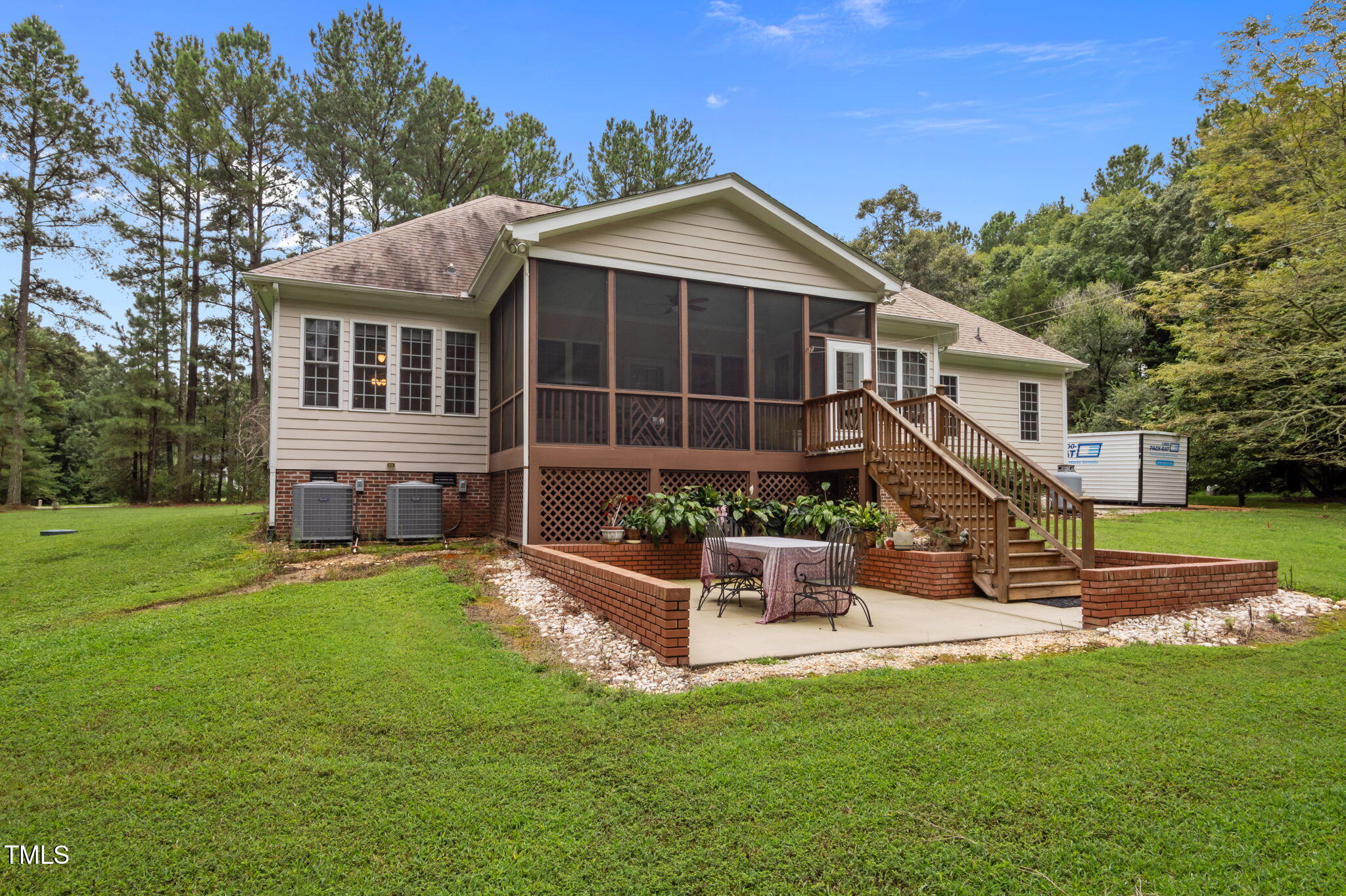 9 Piney Grove Road Bahama, NC 27503 - Photo 28 of 33 a view of a house with a yard porch and sitting area