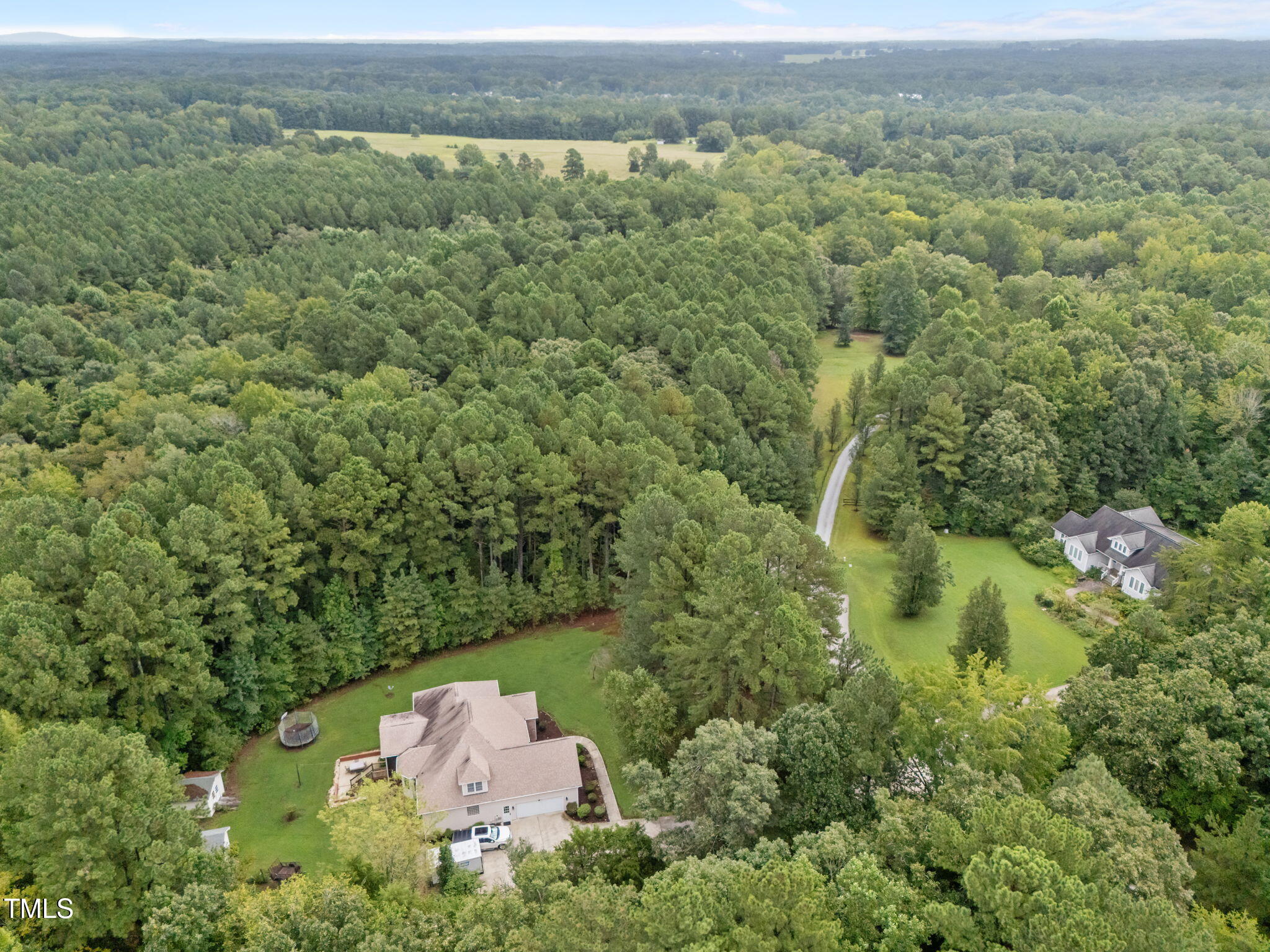 9 Piney Grove Road Bahama, NC 27503 - Photo 32 of 33 an aerial view of a house with a yard