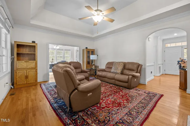 a living room with furniture and a rug