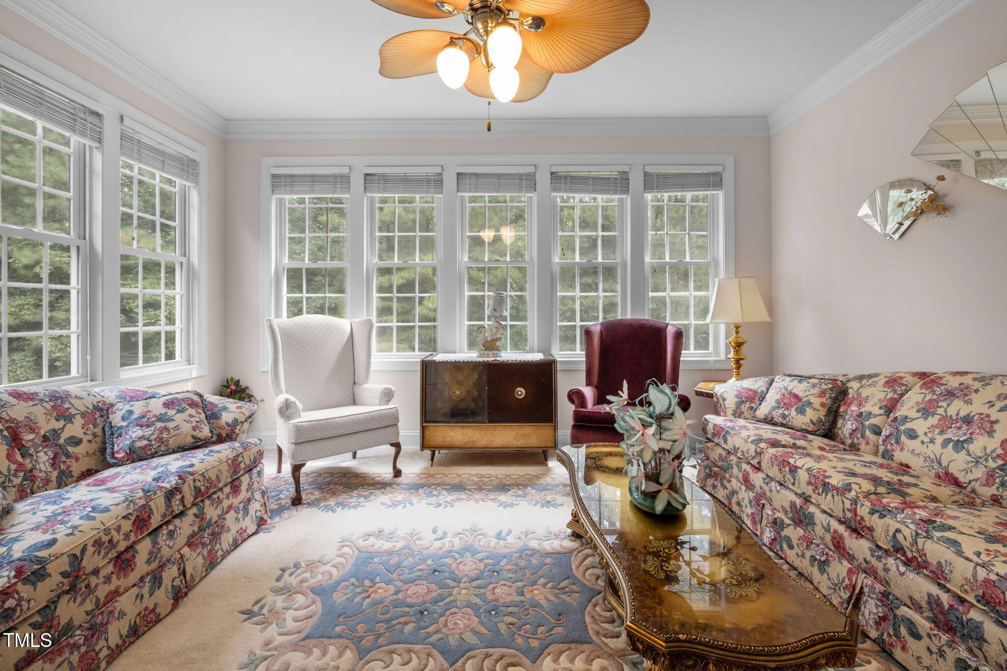 9 Piney Grove Road Bahama, NC 27503 - Photo 6 of 33 a living room with furniture and a large window