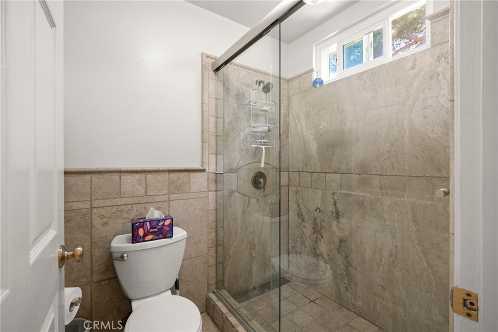 2532 Briar Glen Road Acton, CA 93510 - Photo 19 of 48 a bathroom with a toilet and a shower