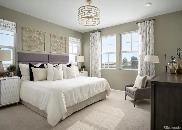 a bedroom with bed and a window