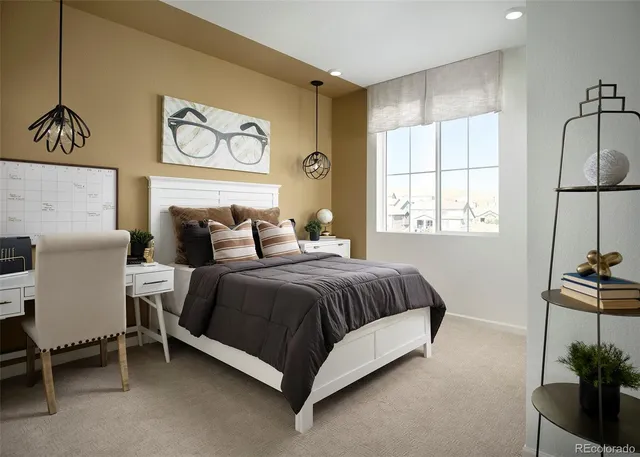 a spacious bedroom with a bed and a table in it