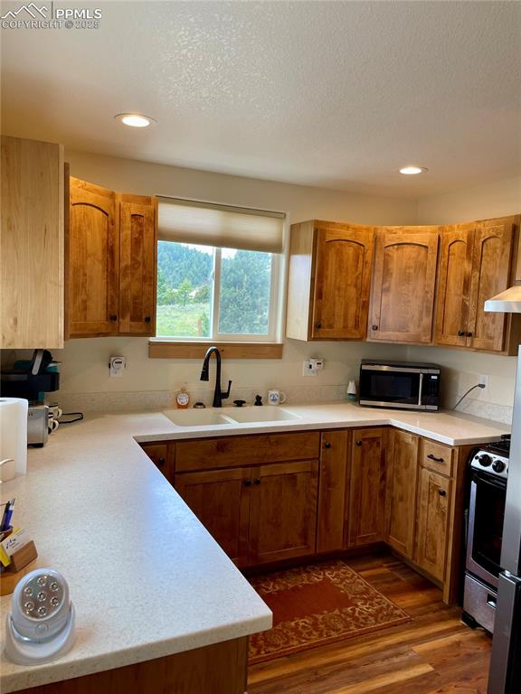 291 Junkins Loop Westcliffe, CO 81252 - Photo 11 of 41 a kitchen with a sink and cabinets