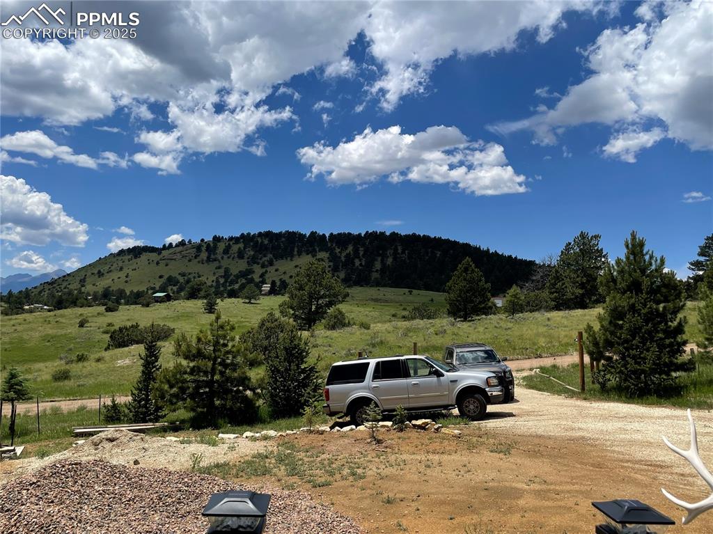 291 Junkins Loop Westcliffe, CO 81252 - Photo 22 of 41 a car parked on the side of a road