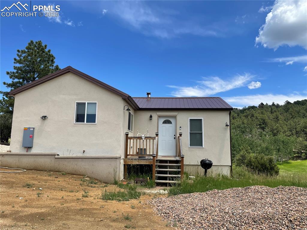 291 Junkins Loop Westcliffe, CO 81252 - Photo 23 of 41 a view of a house with backyard