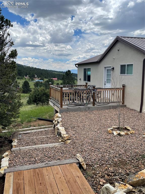 291 Junkins Loop Westcliffe, CO 81252 - Photo 32 of 41 a view of a house with a yard