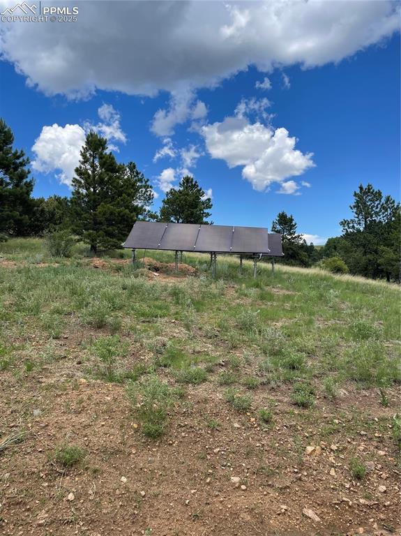 291 Junkins Loop Westcliffe, CO 81252 - Photo 37 of 41 a view of a big yard with a house in the background