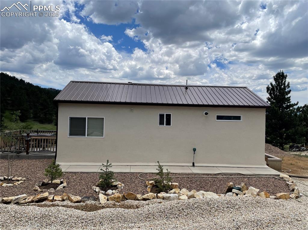 291 Junkins Loop Westcliffe, CO 81252 - Photo 38 of 41 a view of a house with a yard