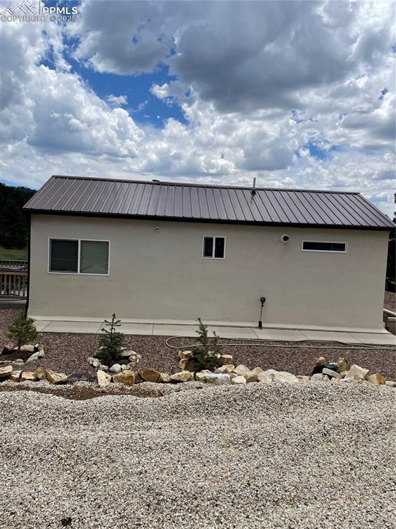 291 Junkins Loop Westcliffe, CO 81252 - Photo 39 of 41 a front view of a house with a yard
