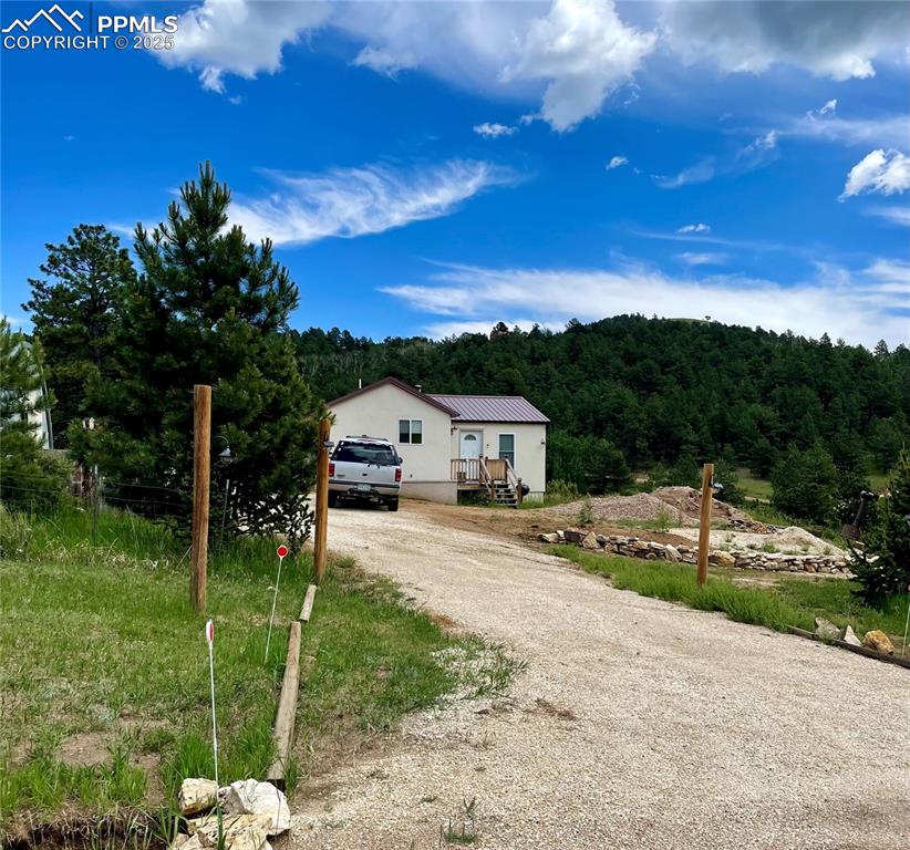 291 Junkins Loop Westcliffe, CO 81252 - Photo 41 of 41 a view of a house with a backyard