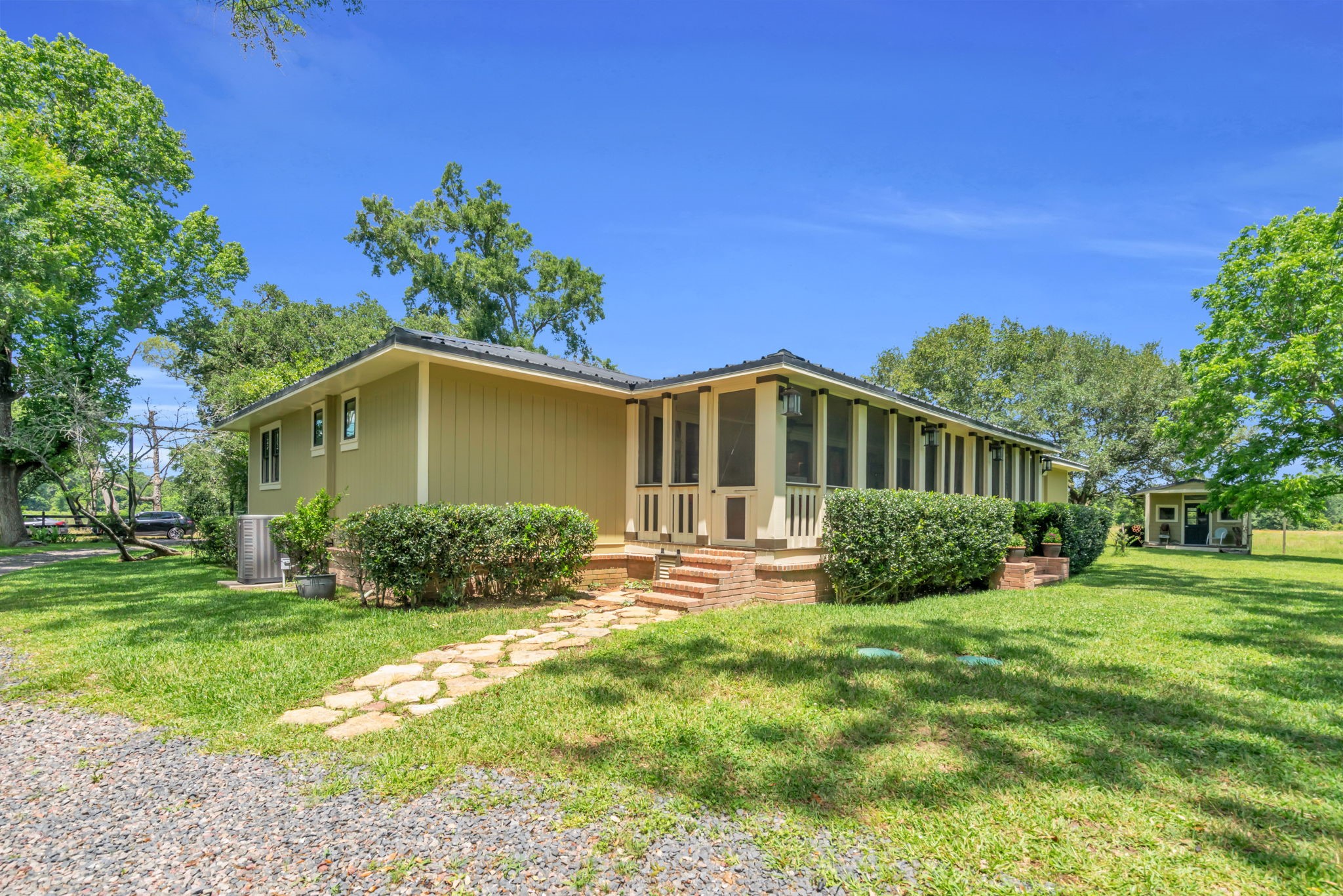 17821 Brown Road Conroe, TX 77306 - Photo 36 of 50 a front view of a house with a yard