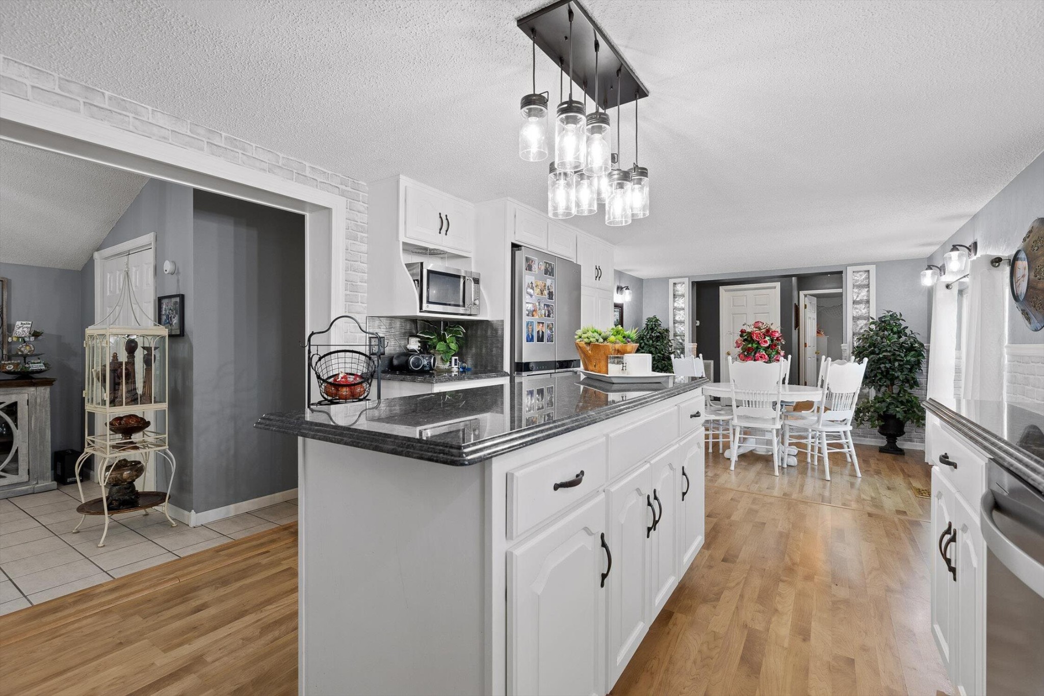 5017 McDonald Road McDonald, TN 37353 - Photo 12 of 52 a kitchen with stainless steel appliances granite countertop a refrigerator and a stove top oven