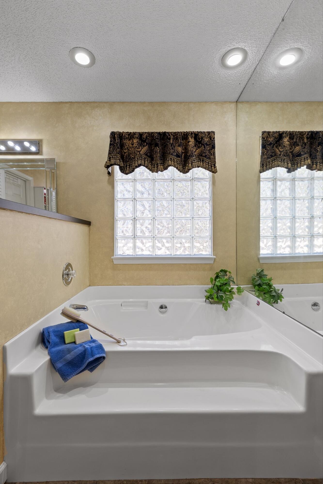 5017 McDonald Road McDonald, TN 37353 - Photo 19 of 52 a bathroom with a bathtub and a window