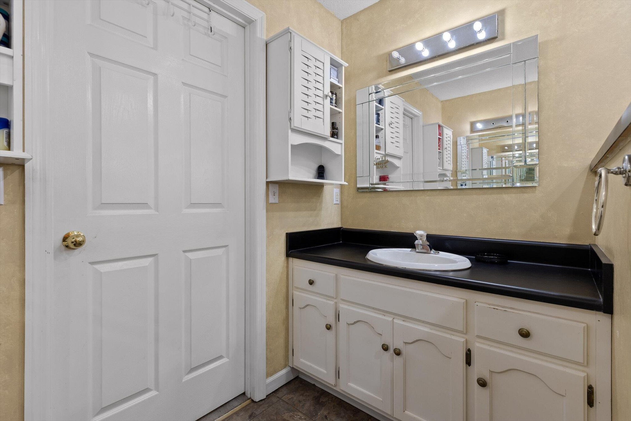 5017 McDonald Road McDonald, TN 37353 - Photo 20 of 52 a bathroom with a granite countertop sink and a mirror