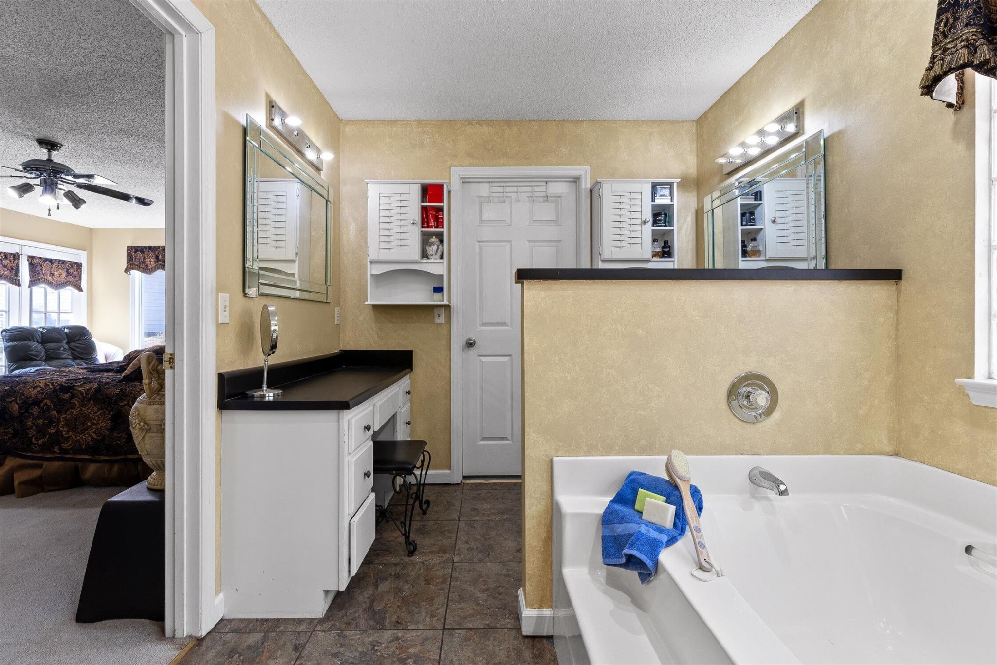 5017 McDonald Road McDonald, TN 37353 - Photo 21 of 52 a bathroom with a tub sink and mirror