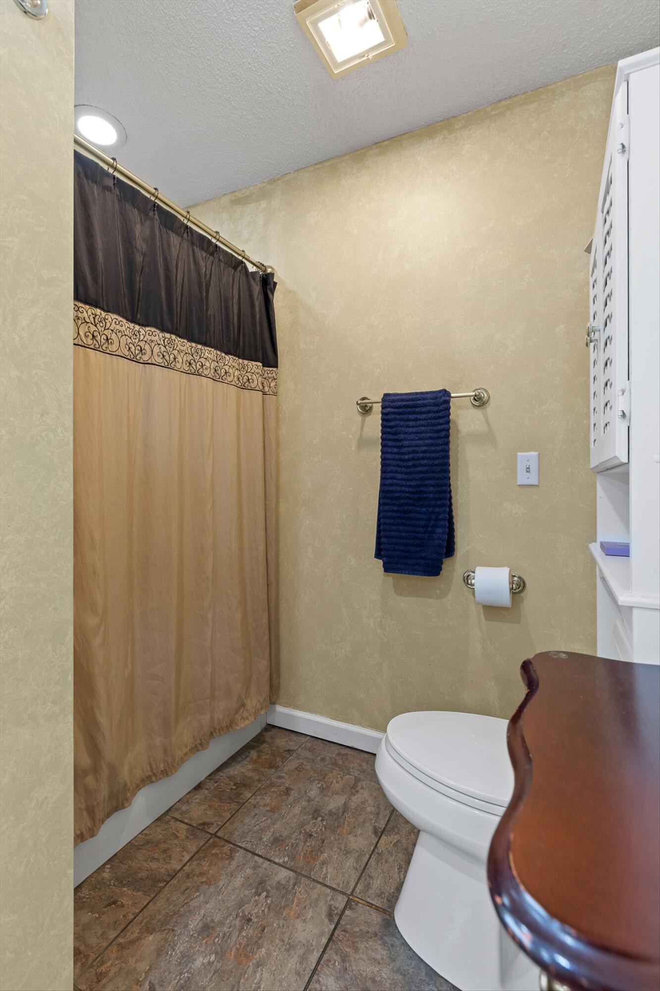 5017 McDonald Road McDonald, TN 37353 - Photo 22 of 52 a bathroom with a toilet and a shower curtain