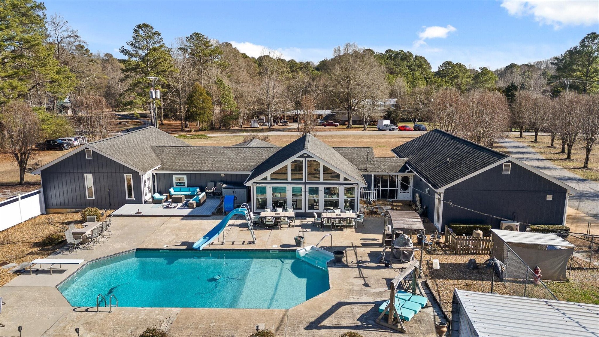 5017 McDonald Road McDonald, TN 37353 - Photo 27 of 52 a view of a house with pool and chairs