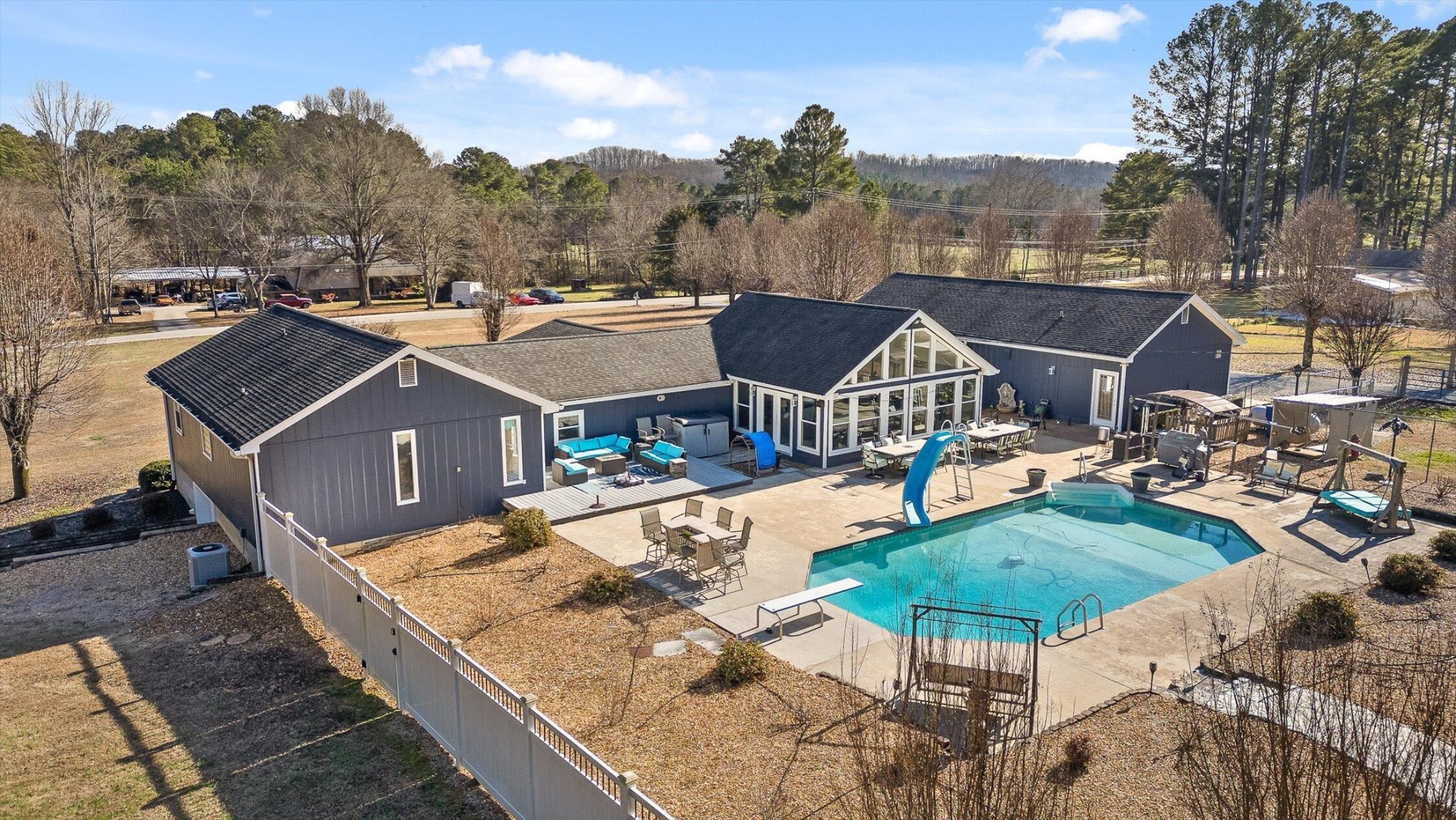 5017 McDonald Road McDonald, TN 37353 - Photo 28 of 52 a view of a house with pool and chairs