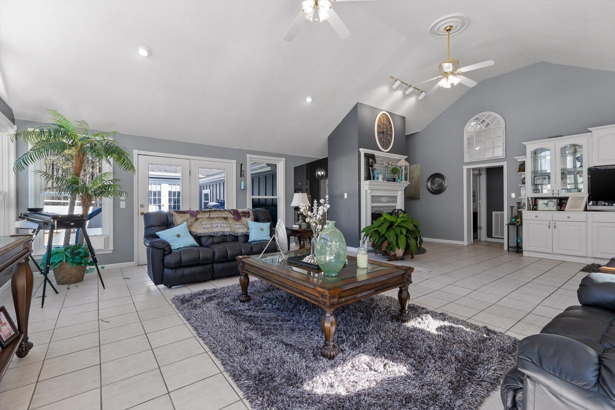 5017 McDonald Road McDonald, TN 37353 - Photo 8 of 52 a living room with furniture a chandelier a rug and a chandelier