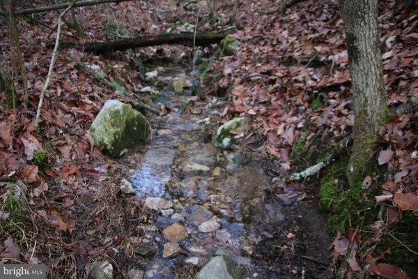 a aerial view of a house with a yard