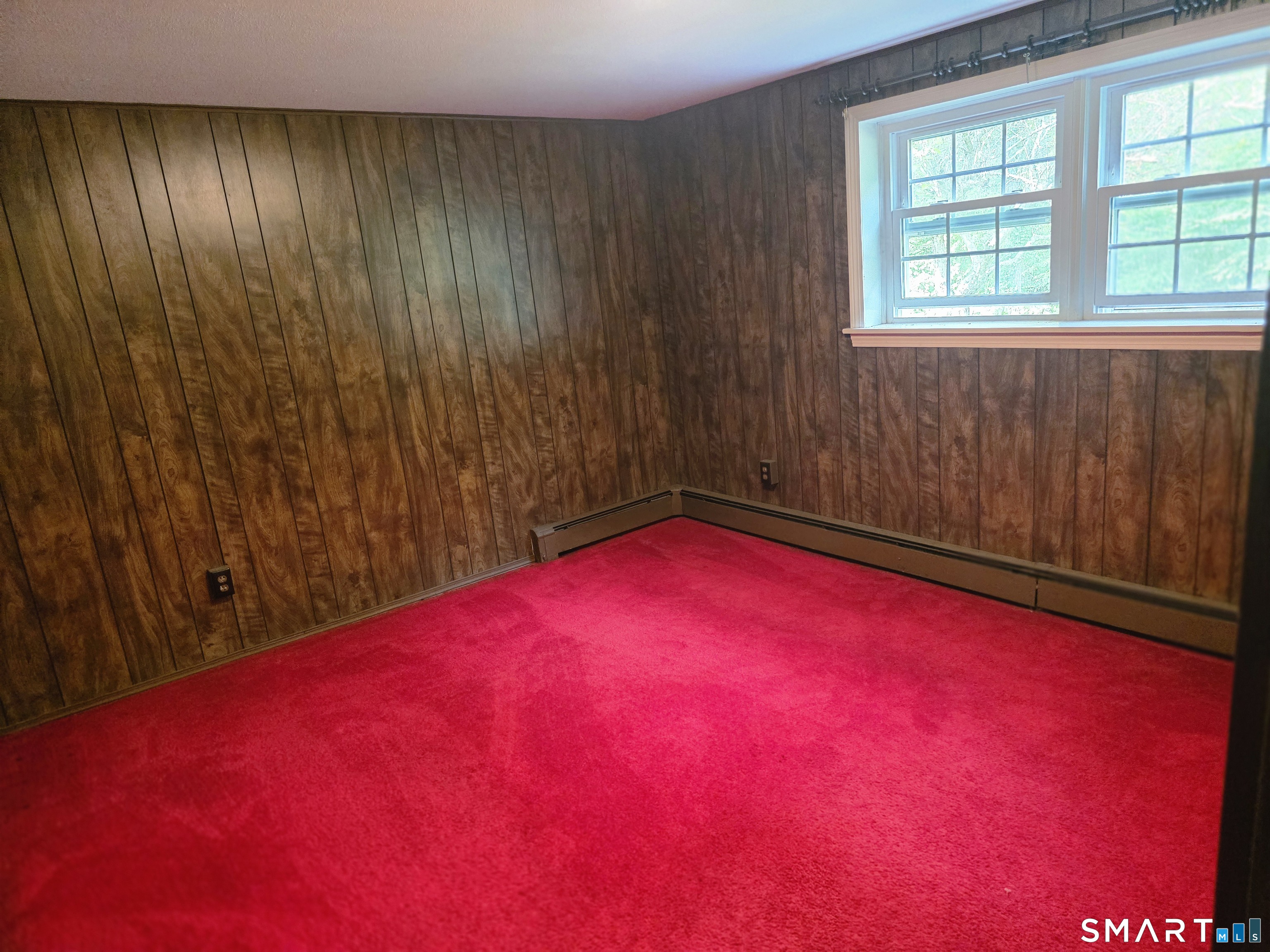 279 Gales Ferry Road Groton, CT 06340 - Photo 28 of 32 Lower Level finished room w/closet. This room could be used as an extra bedroom, Office, Craft room, etc.