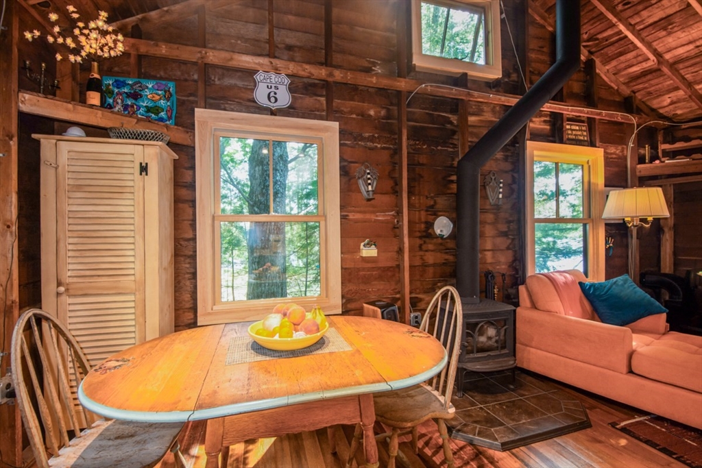 213 Ashby Road Ashburnham, MA 01430 - Photo 14 of 39 a outdoor dining space with furniture and window
