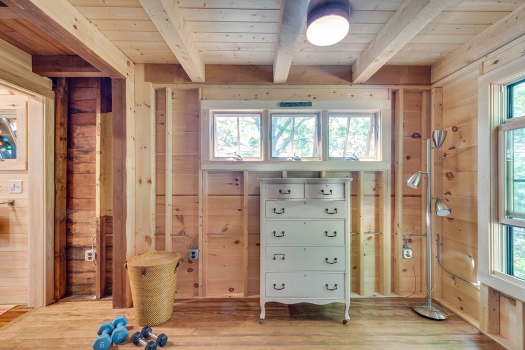 213 Ashby Road Ashburnham, MA 01430 - Photo 17 of 39 wooden floor in an empty room with a window
