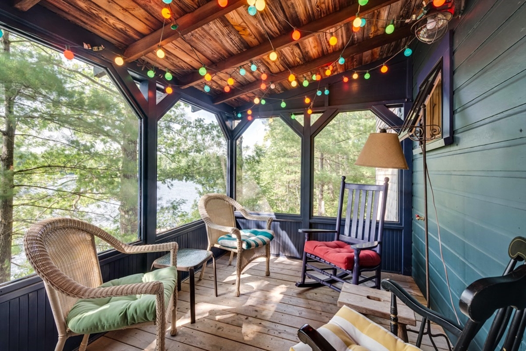 213 Ashby Road Ashburnham, MA 01430 - Photo 26 of 39 a outdoor living space with patio furniture and a fireplace