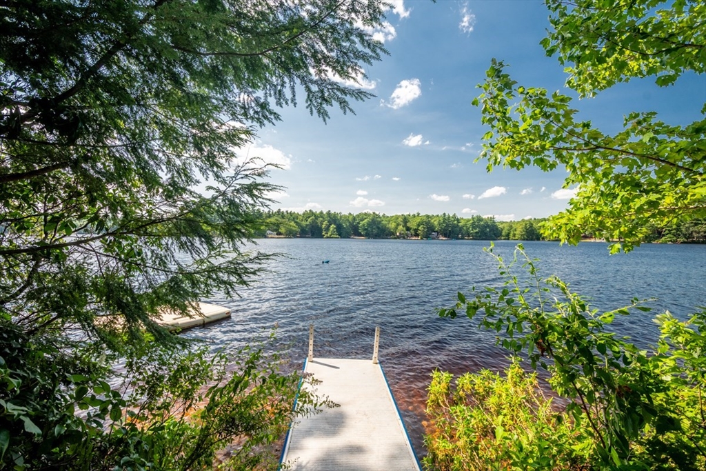 213 Ashby Road Ashburnham, MA 01430 - Photo 29 of 39 a view of a lake with a yard