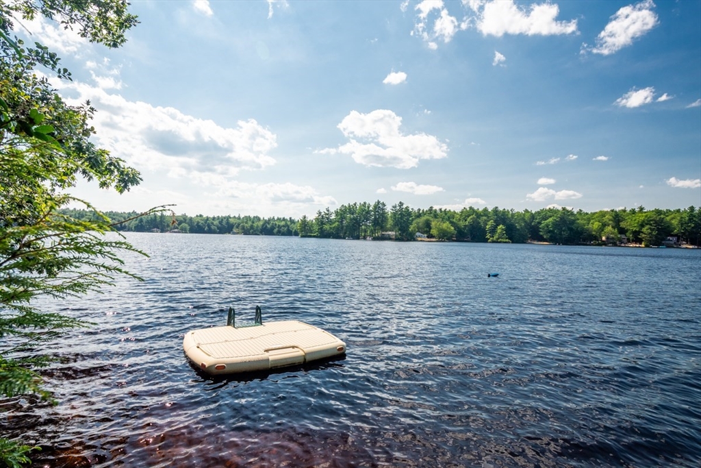 213 Ashby Road Ashburnham, MA 01430 - Photo 30 of 39 a view of a swimming pool with a yard from a outdoor seating