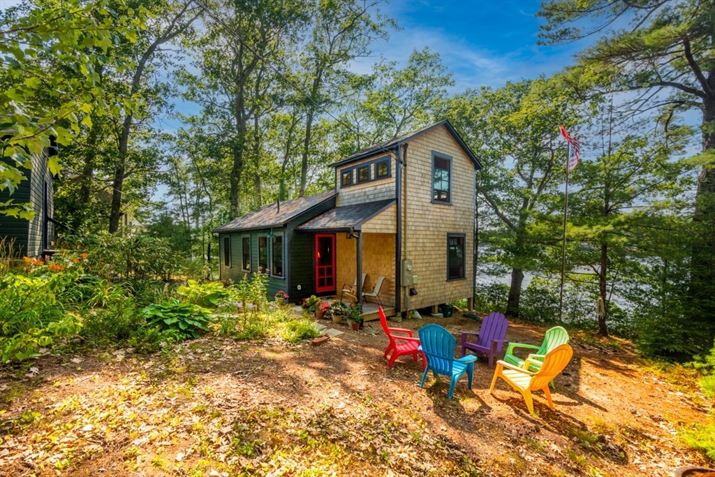 213 Ashby Road Ashburnham, MA 01430 - Photo 3 of 39 a view of a house with backyard and sitting area