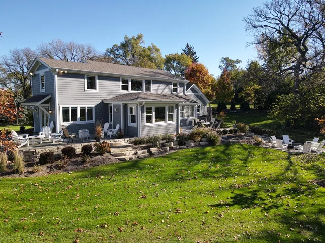 a view of a chairs and table in a patio
