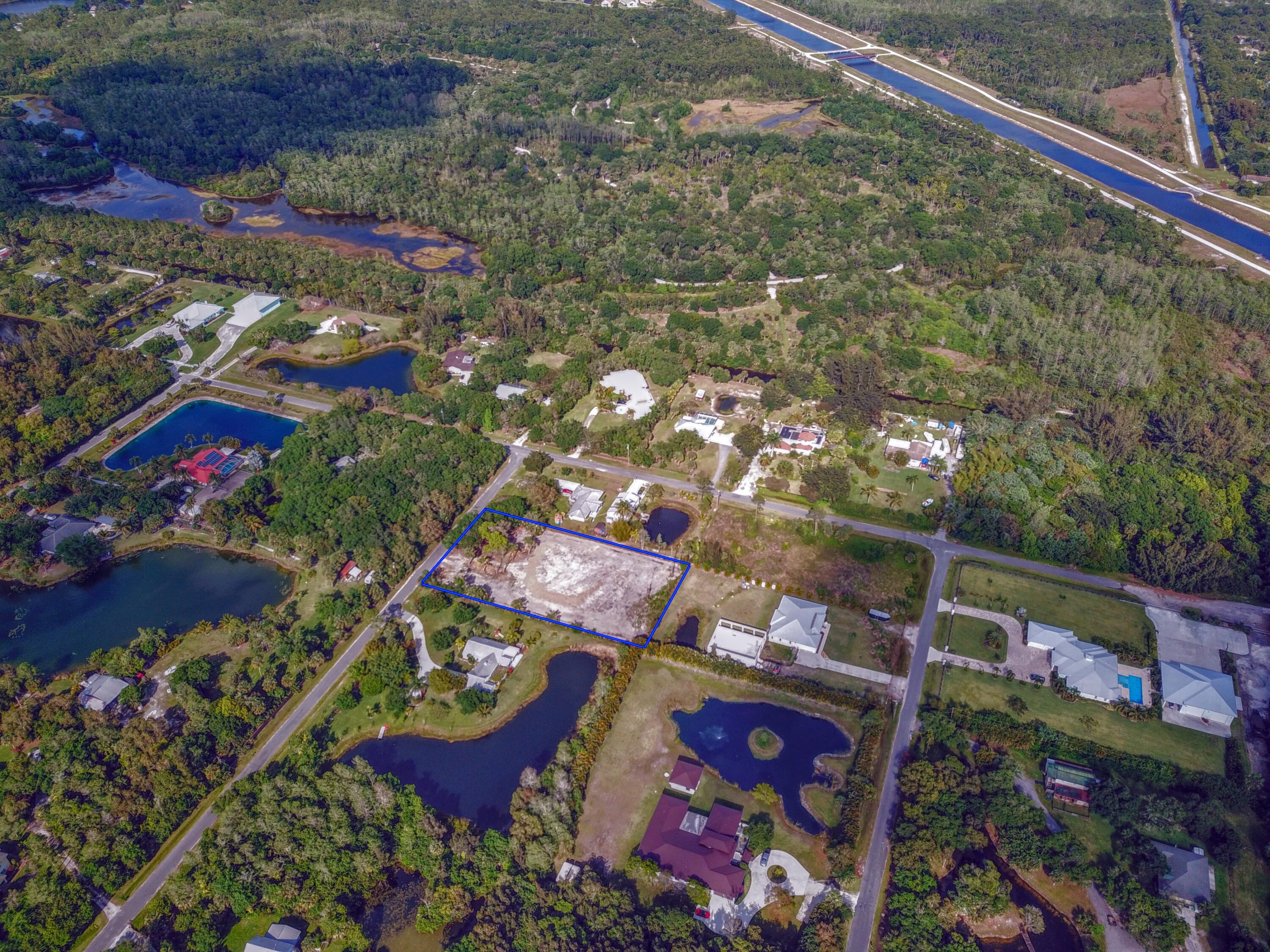 9120 Mockingbird Trail Jupiter, FL 33478 - Photo 7 of 12 7