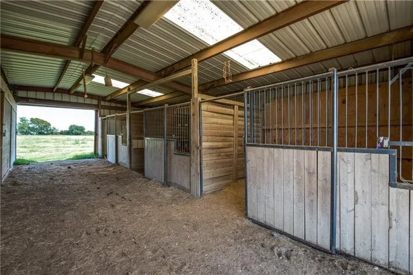 a view of a backyard of a house
