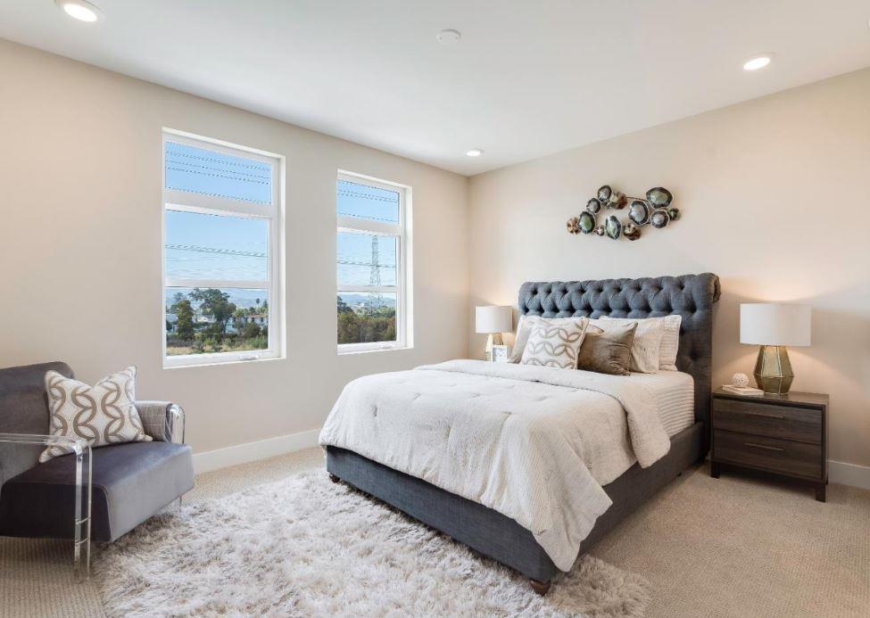 400 Mariners Island Boulevard, Unit 215 San Mateo, CA 94404 - Photo 11 of 29 a bedroom with a bed and a couch